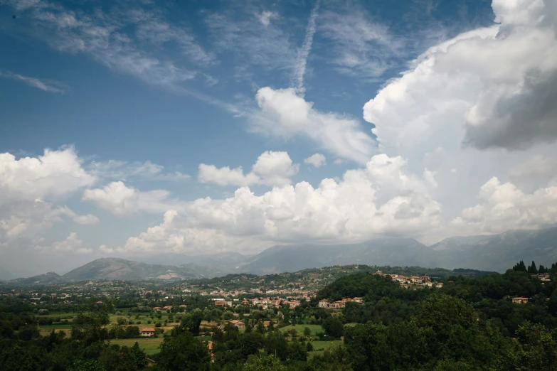 the clouds are moving quickly in the sky