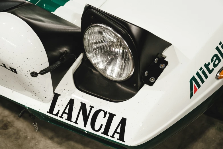 the front end of an italian racing car with its hood