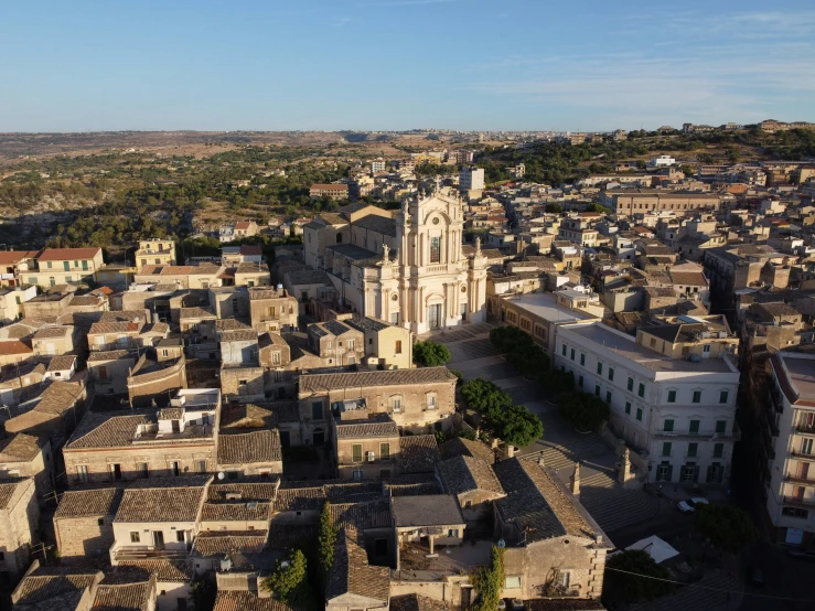 an aerial s of some buildings and a clock tower