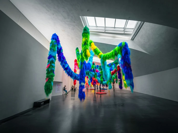 a colorful display is hanging in the middle of the floor