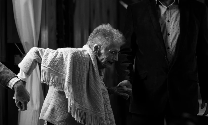 a woman in the midst of a crowd of people