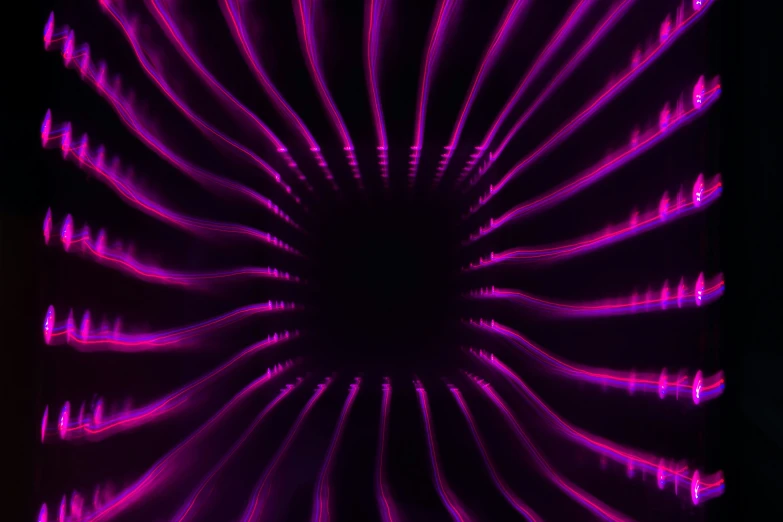 a purple light shows pink streaks in the center