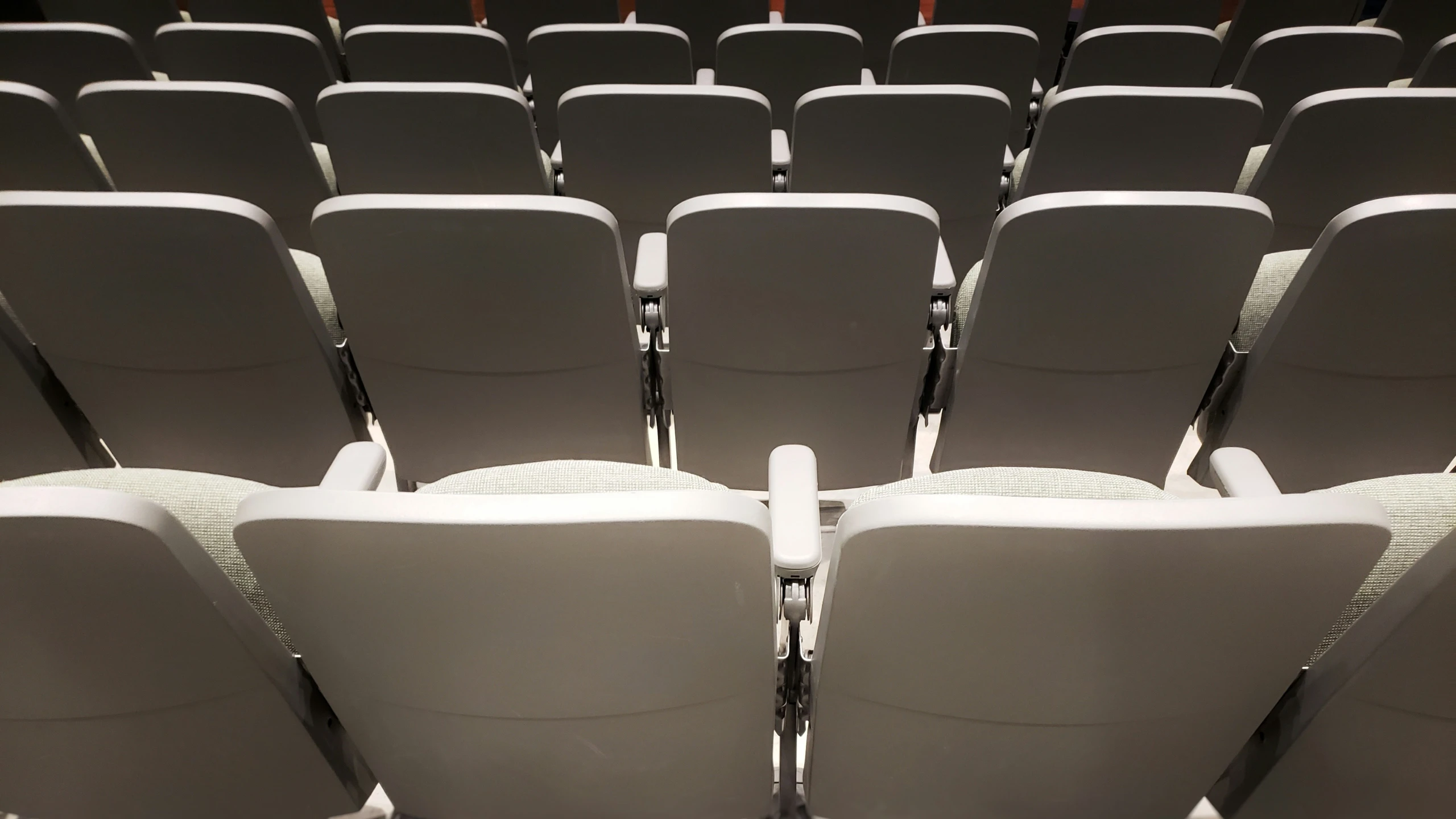 rows of chairs set up for an audience