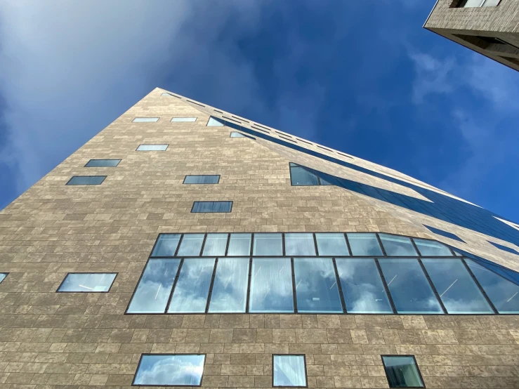 the building is made of bricks with a side window