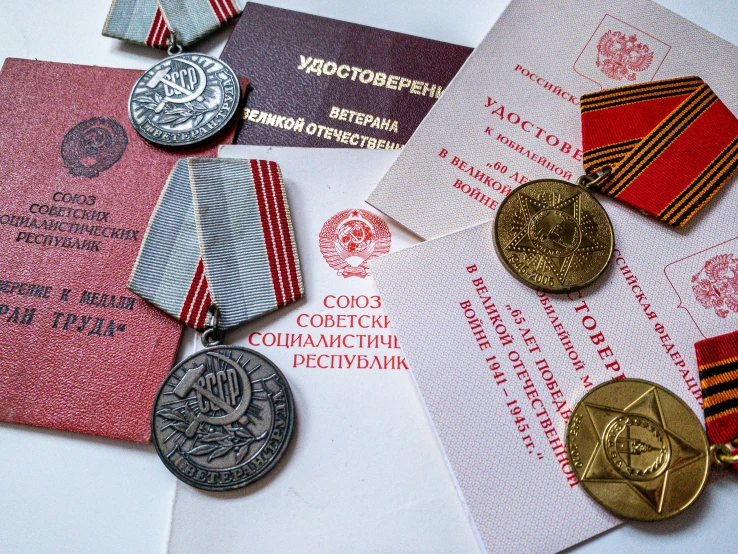 some commemorative medals are displayed for the camera