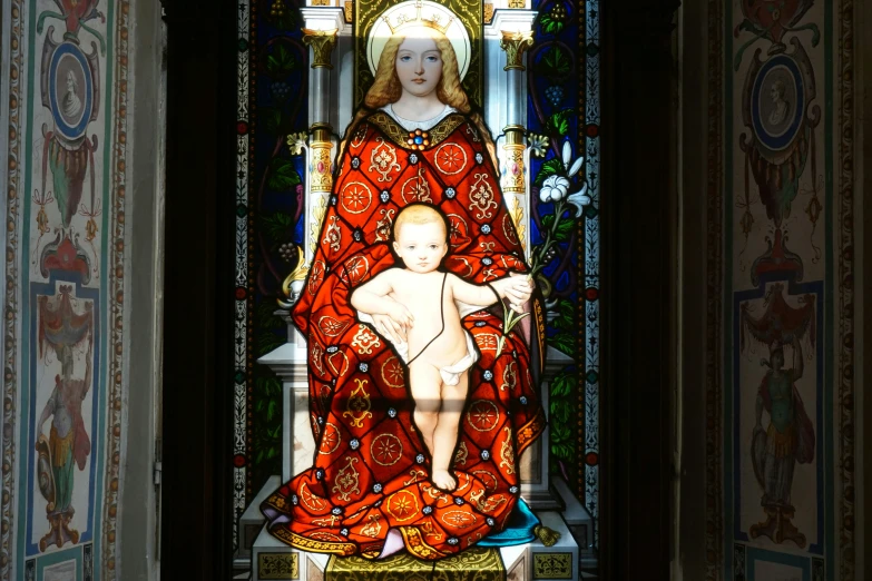 an image of a stained glass window with a child