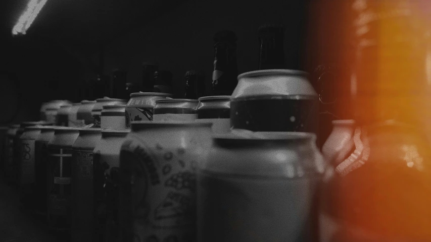 a dark background shows vases on display at a store