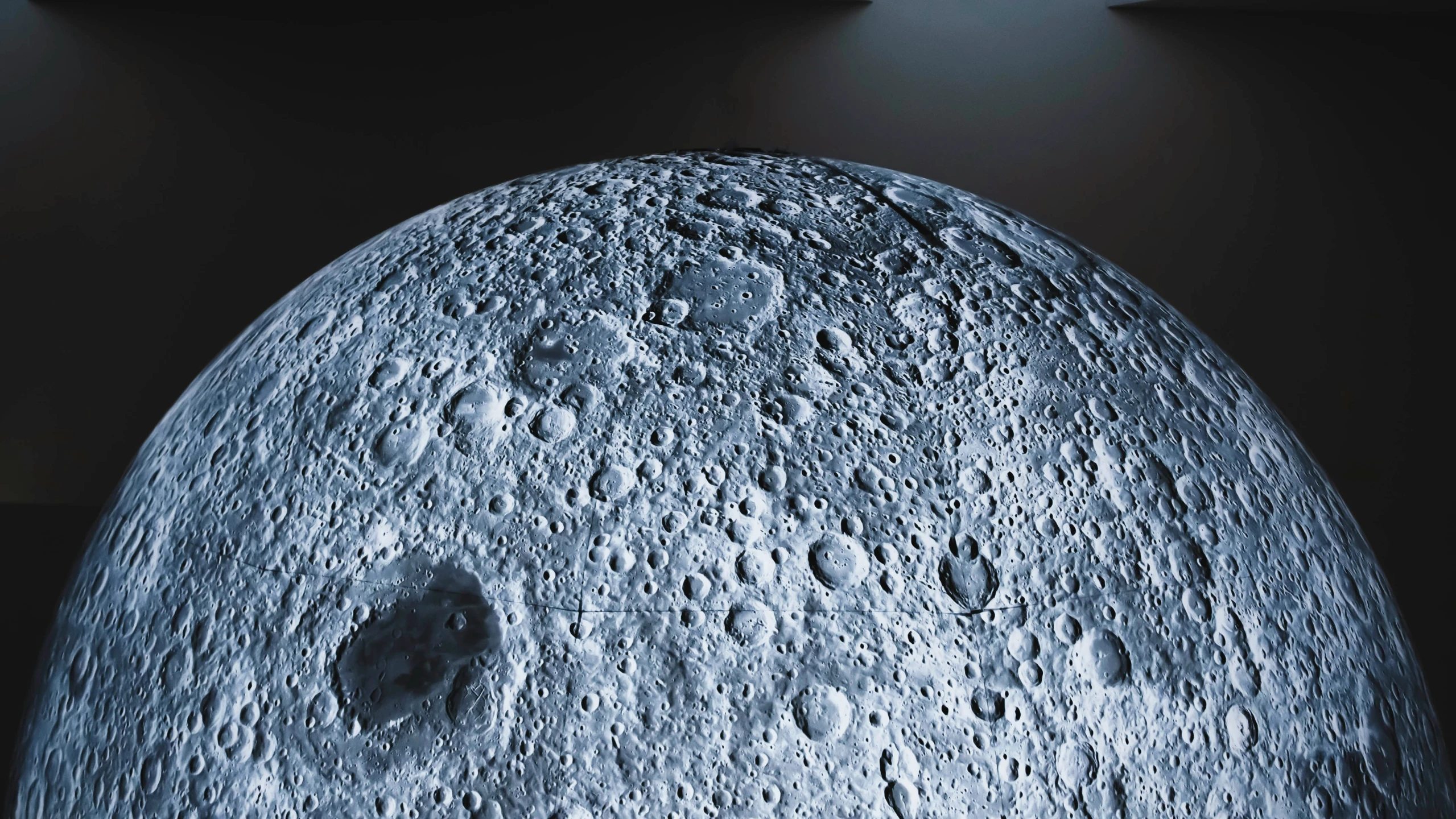 the surface of a moon seen through an eclipse lens