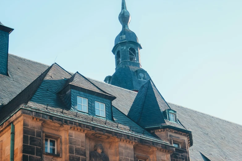 some kind of brown building with a tower on top