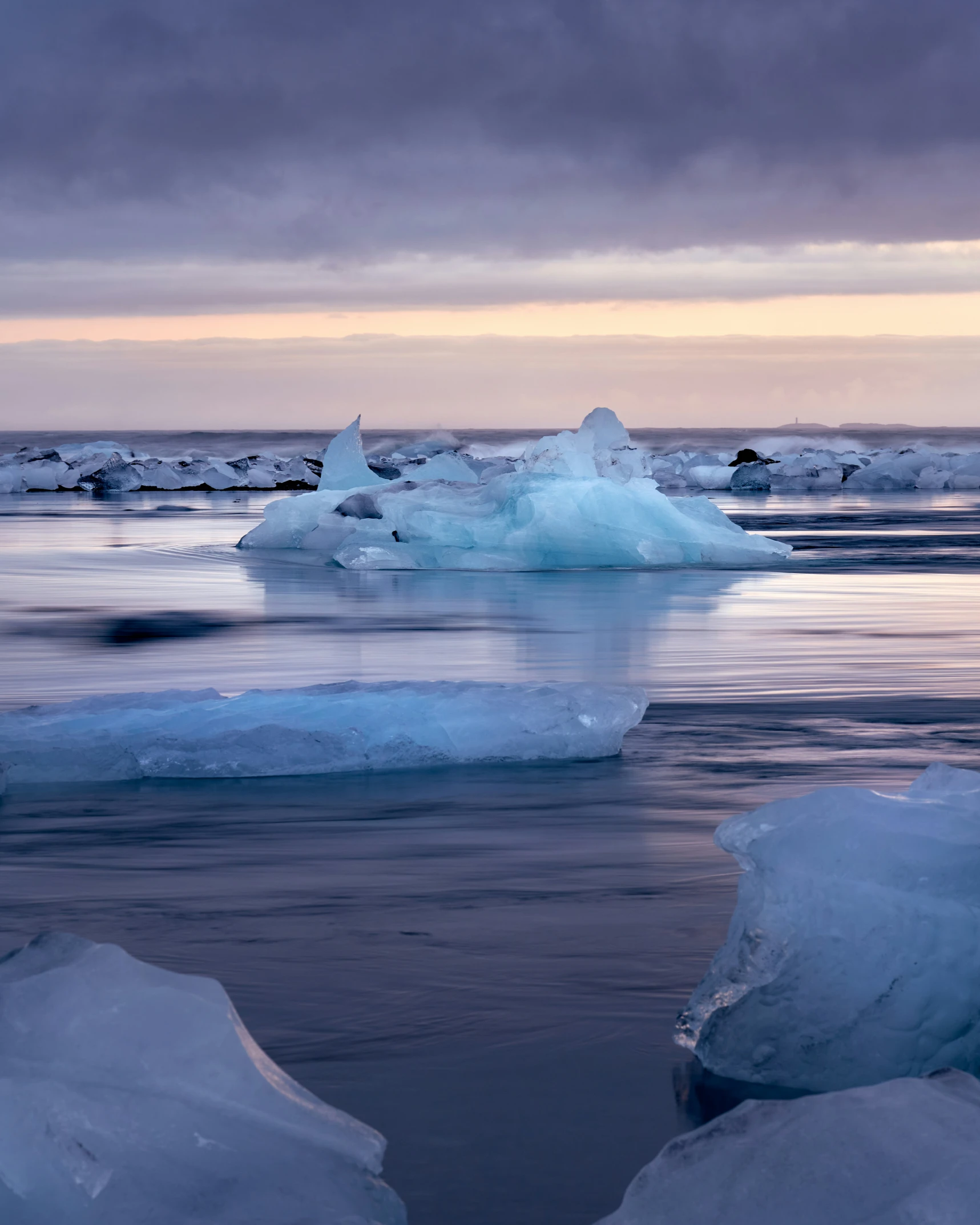 the water is very frozen and you can see a couple of ice chunks