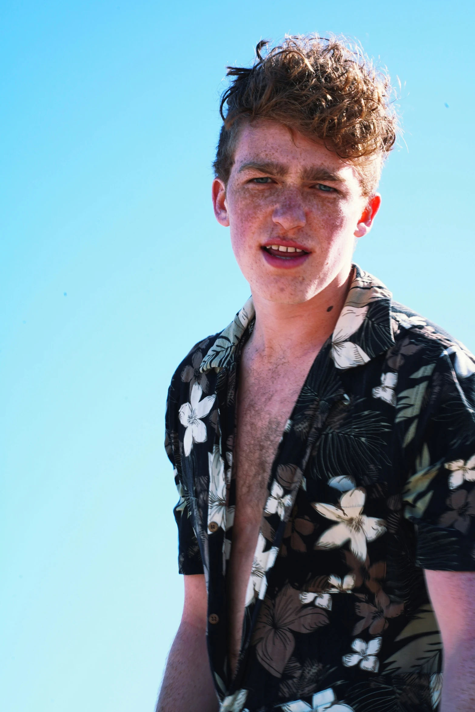 a young man looks to be having his face shaved off