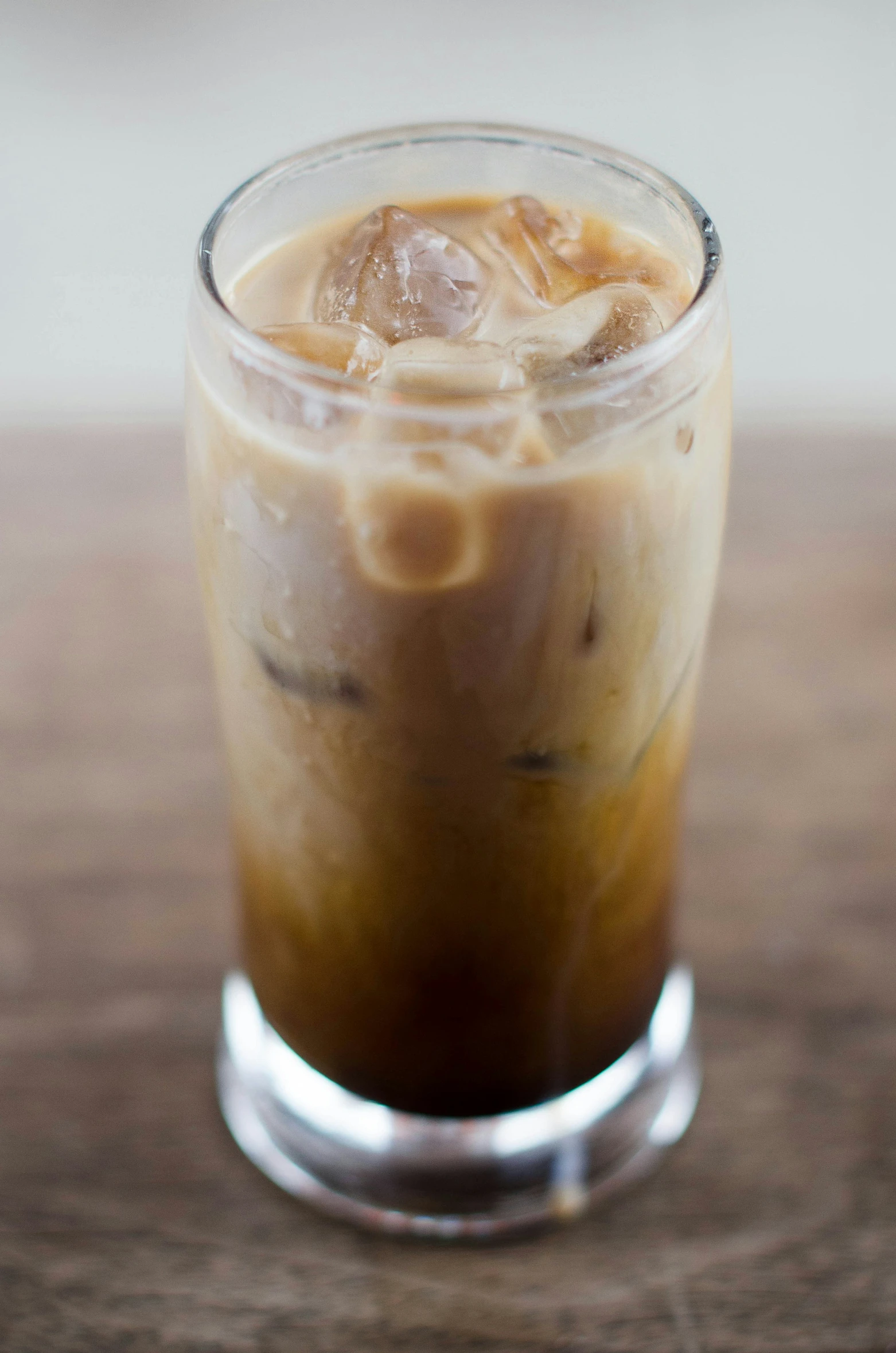 a close up of an iced drink in a cup