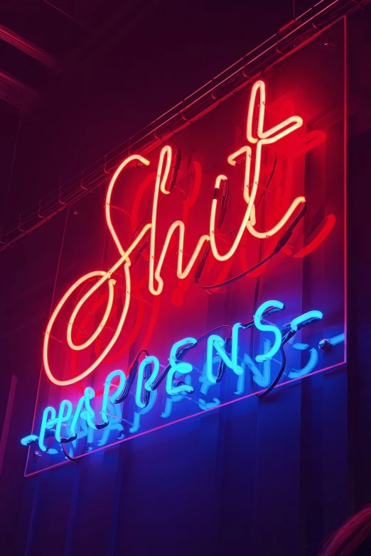 a neon sign that reads  hangens