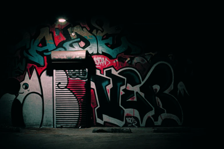 a wall with graffiti is covered with a tinting