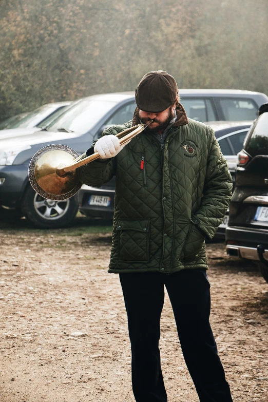 a person with a baseball glove and a ball