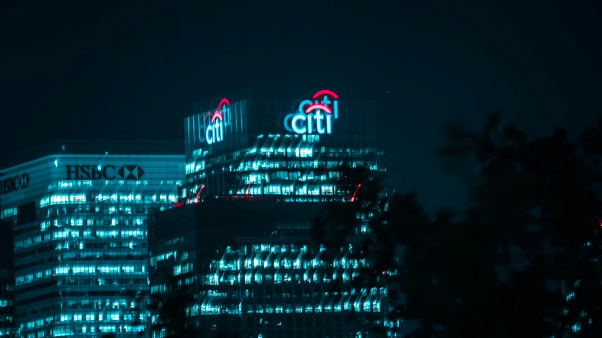 a building is lit up with the word glob on it's side