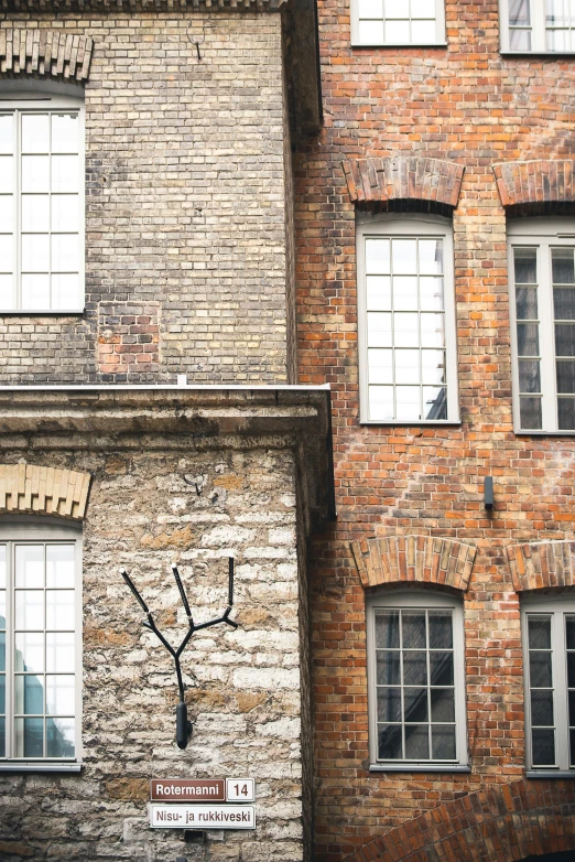 a building with a tree painting on it's side