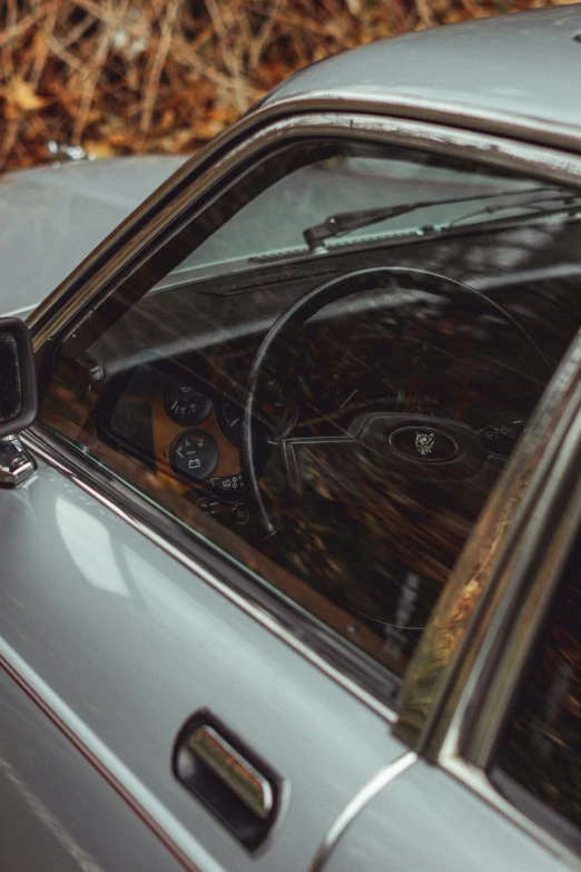 a car with the sunroof of it is seen