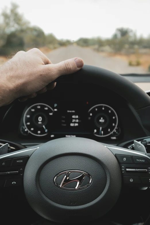 a close up of the steering wheel and dashboard of a car