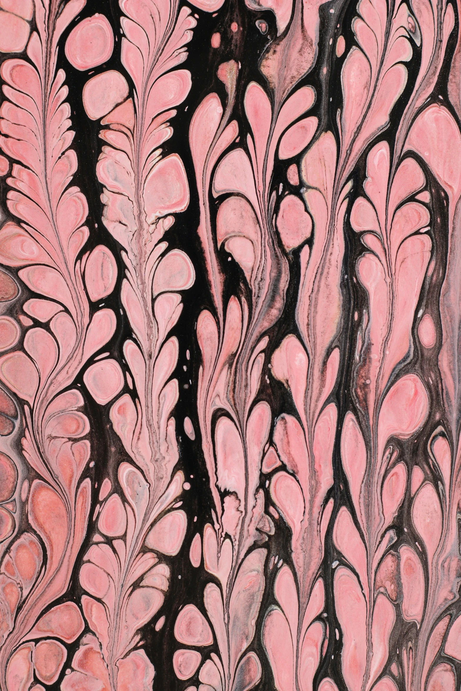 this is an abstract design of pink and black leaves