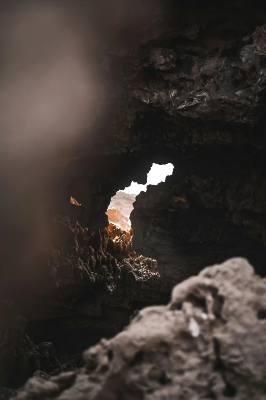 an orange object is inside of a cave