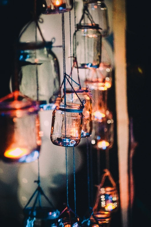 a po of a string of candles hanging from a ceiling