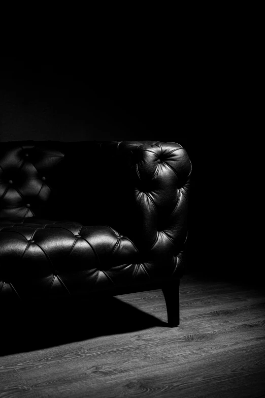 black and white po of an elegant chair in dark