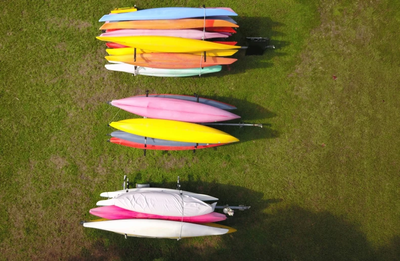 three colorful surf boards lined up against each other