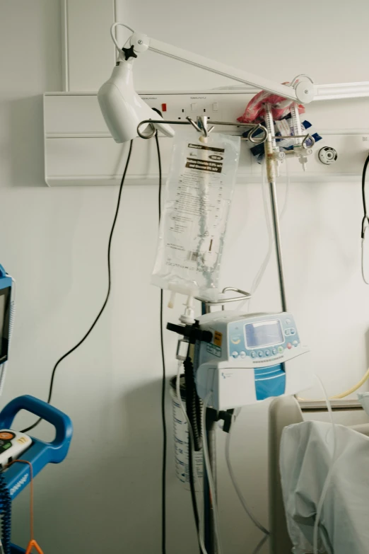 a hospital room that is equipped with medical equipment