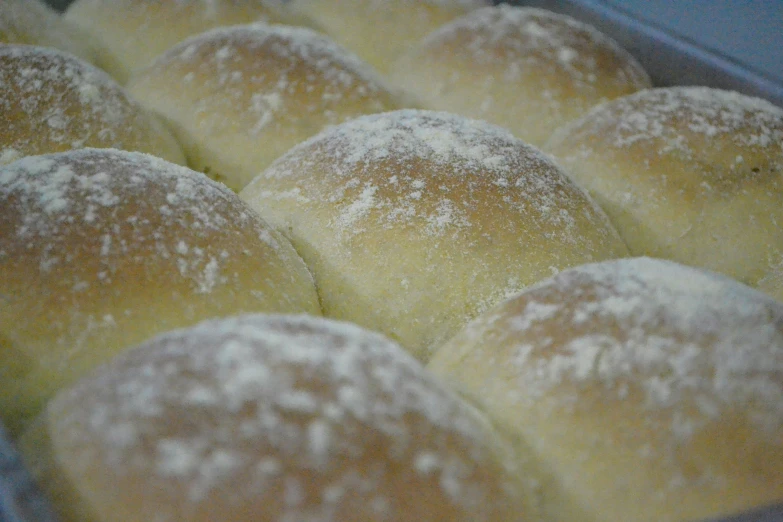 a close up of rolls that have been cooked