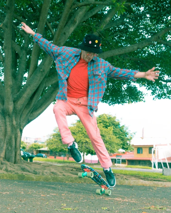 a man that is on a skateboard in the dirt