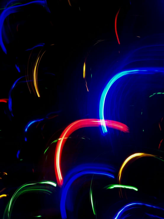 a variety of circular colored light trails