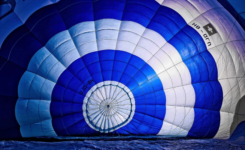 a very large blue and white  air balloon