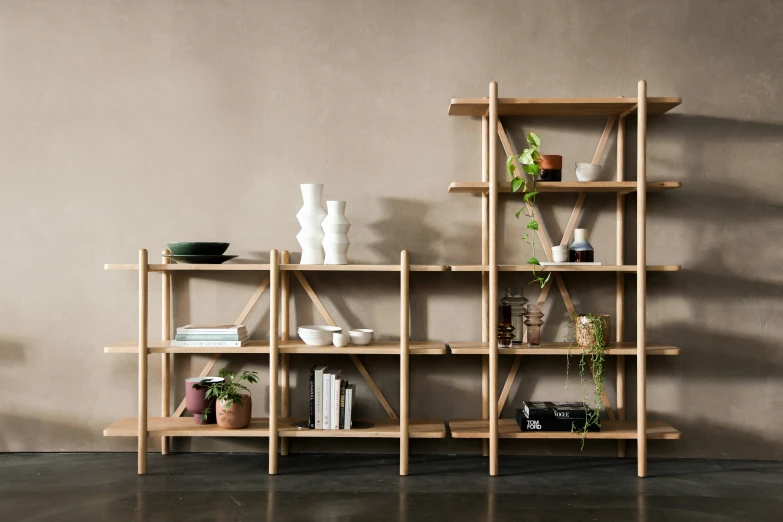 a shelf filled with different pots and plants