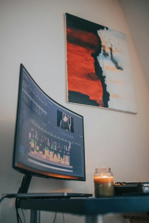 a computer screen on top of a table