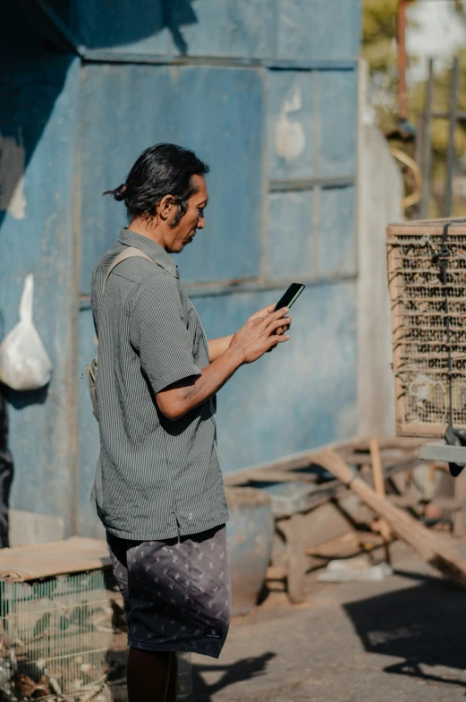 an old woman looking at her cell phone