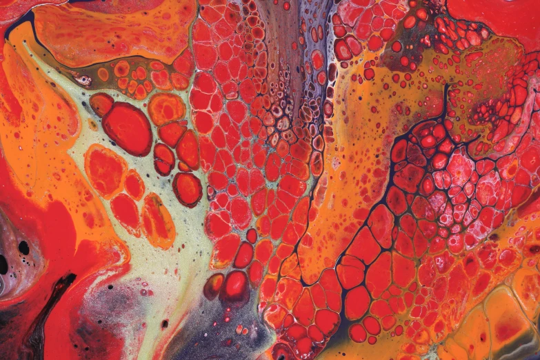 an abstract painting depicting different colors of red, orange and yellow