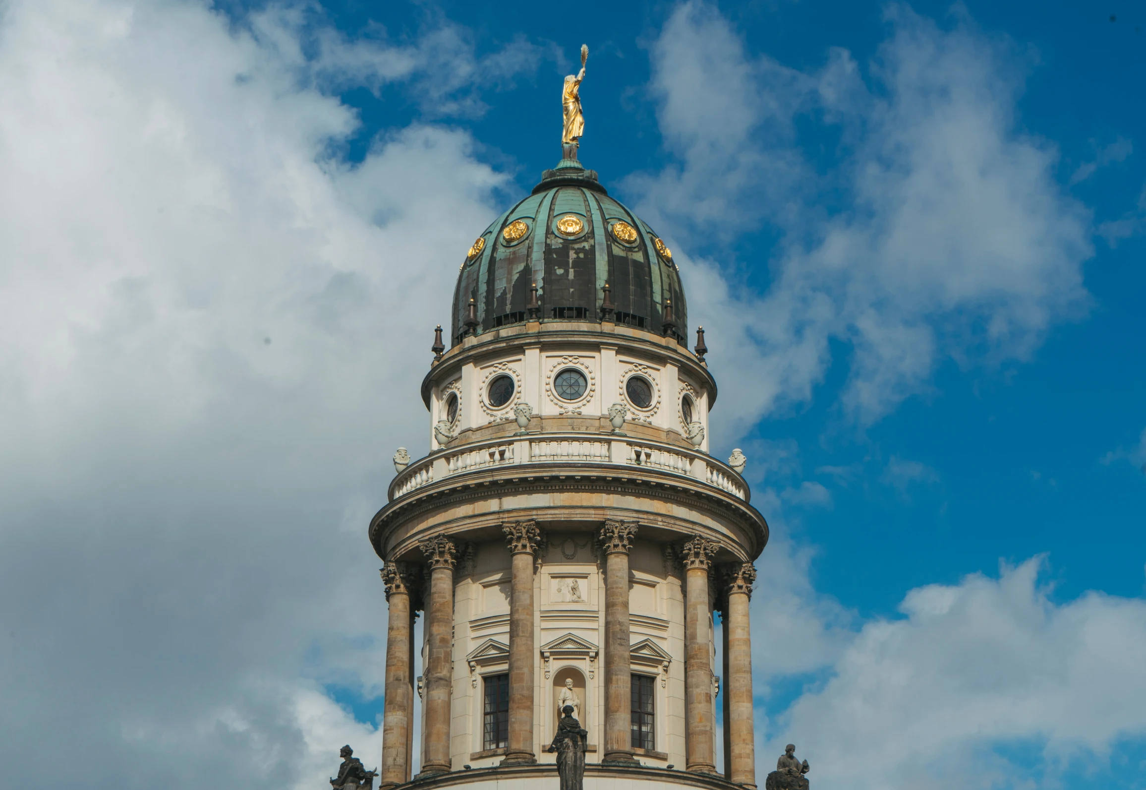 a tower with a clock on top that is against the sky