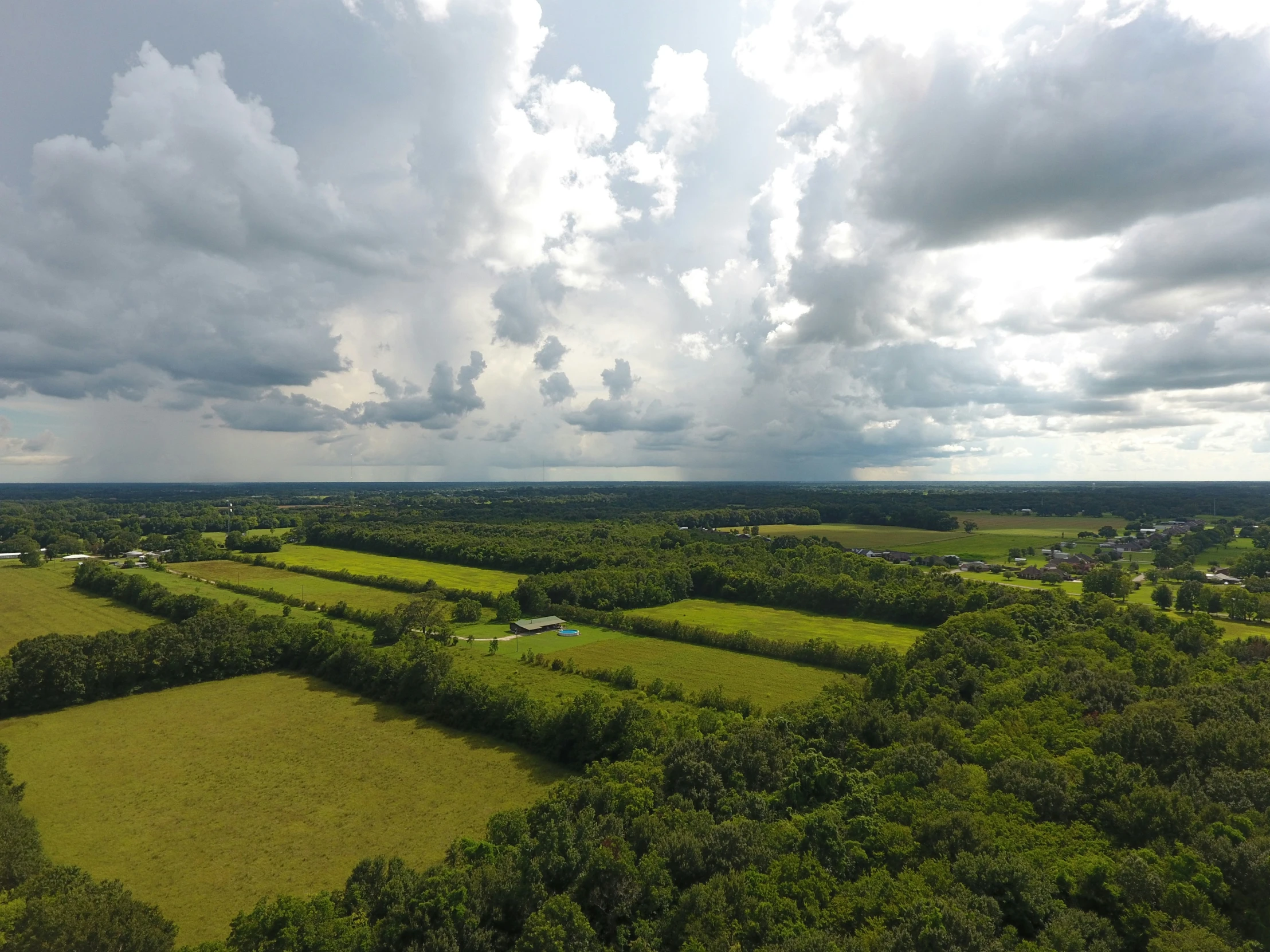 a view from above looking down on many farm land