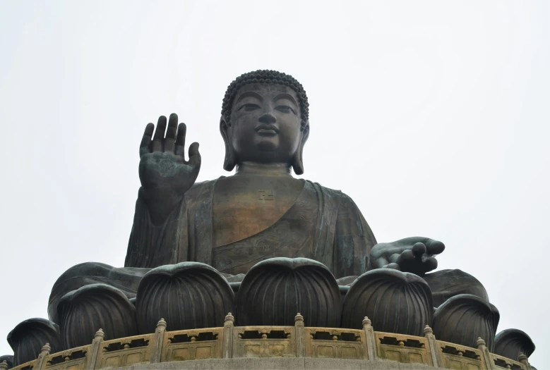 a large statue in the middle of a circular area