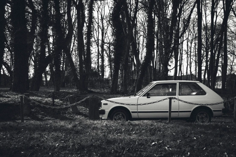 an old abandoned car that has been  down