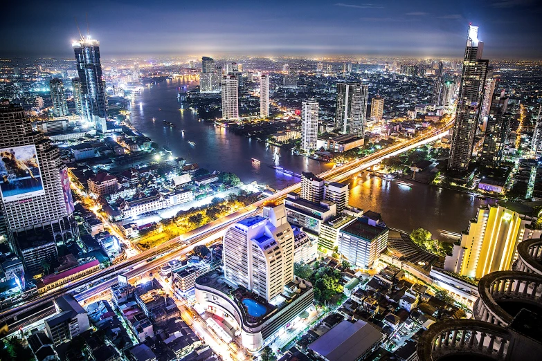 night aerial view of a city with bridges