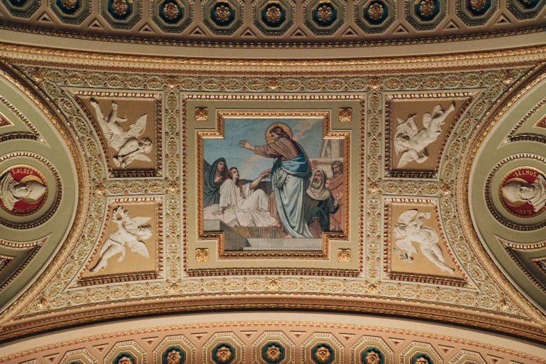 a mosaic painting is mounted on the ceiling