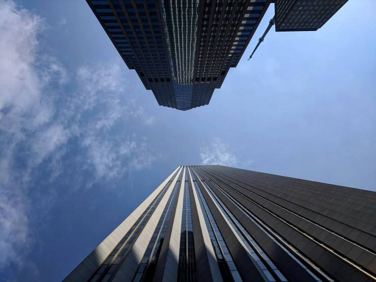 skyscrs against the sky as seen from below