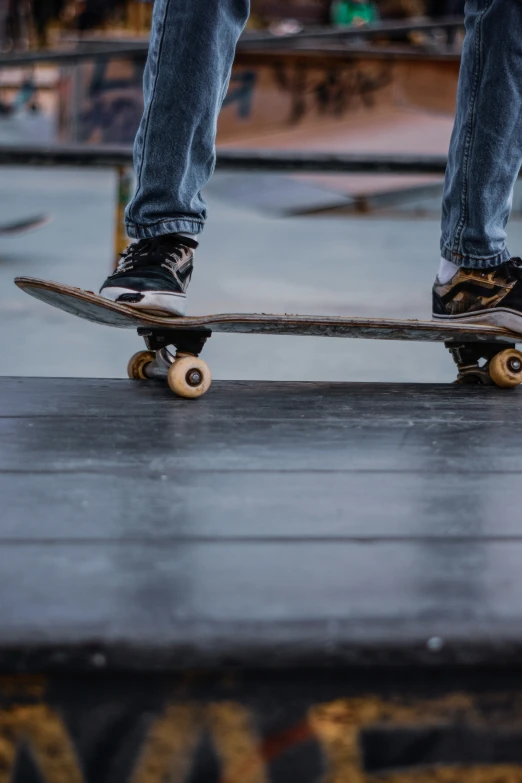 there are a few skateboarders that have stopped at the park