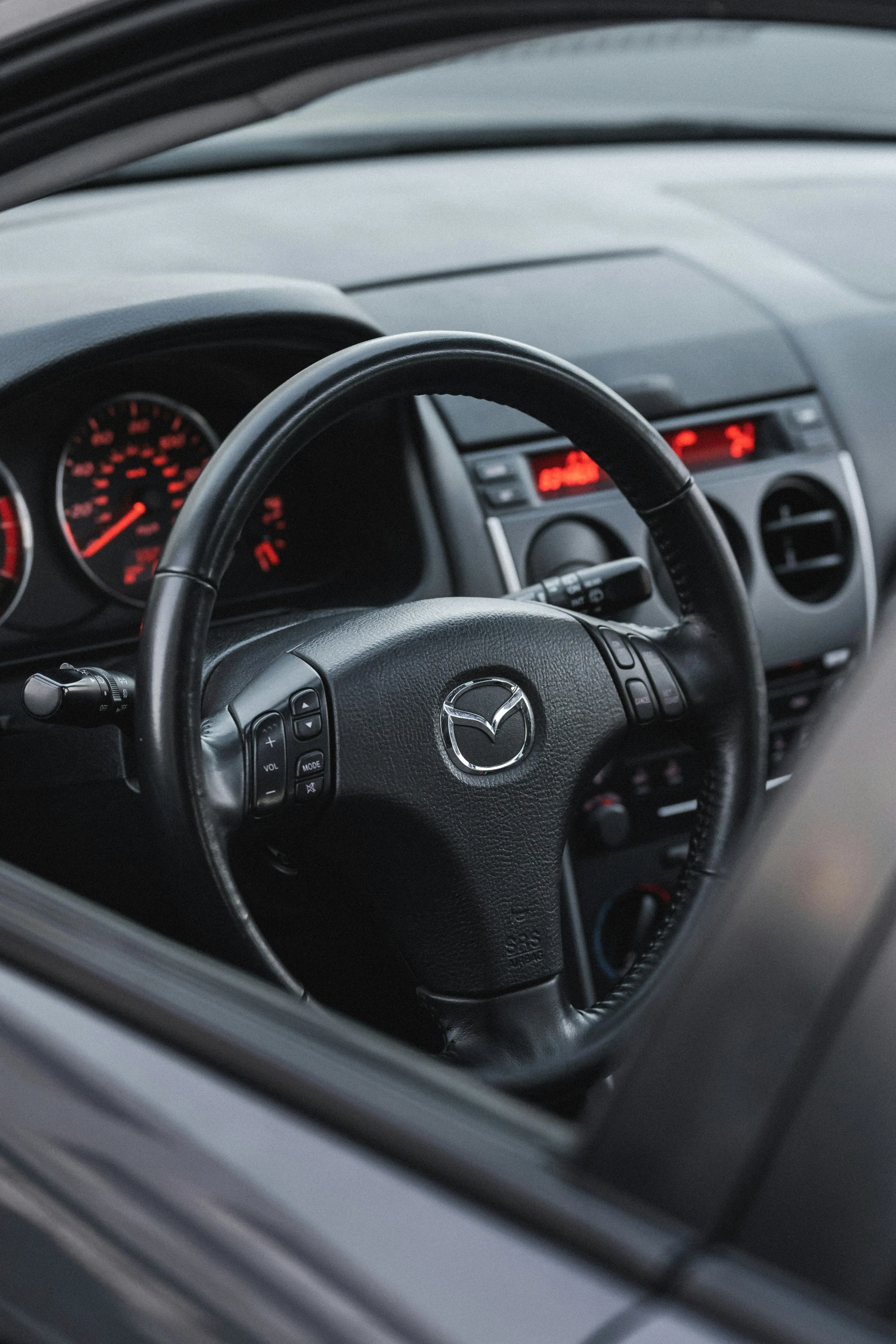 there is a dashboard of the car and the dash lights