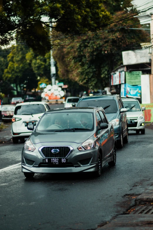 a car is parked at a very narrow curb