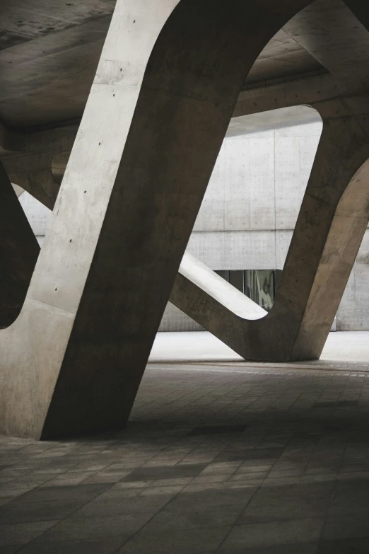 abstract structure with large wavy lines under a roof