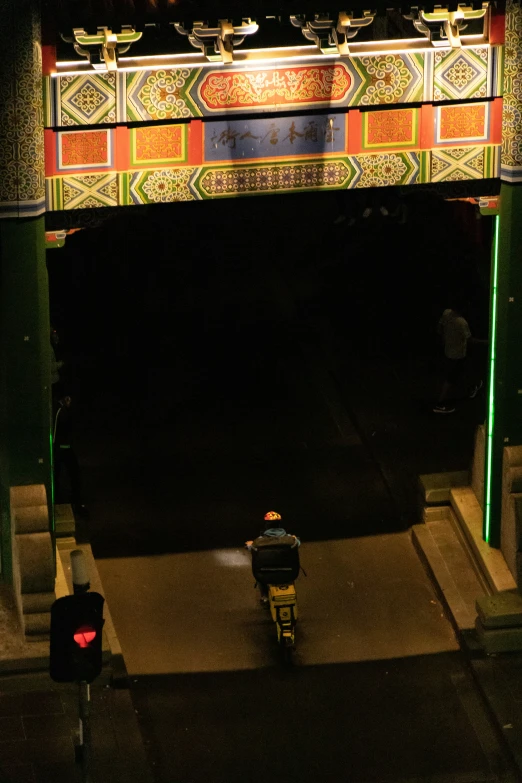 the back wall of a street under a multicolored building