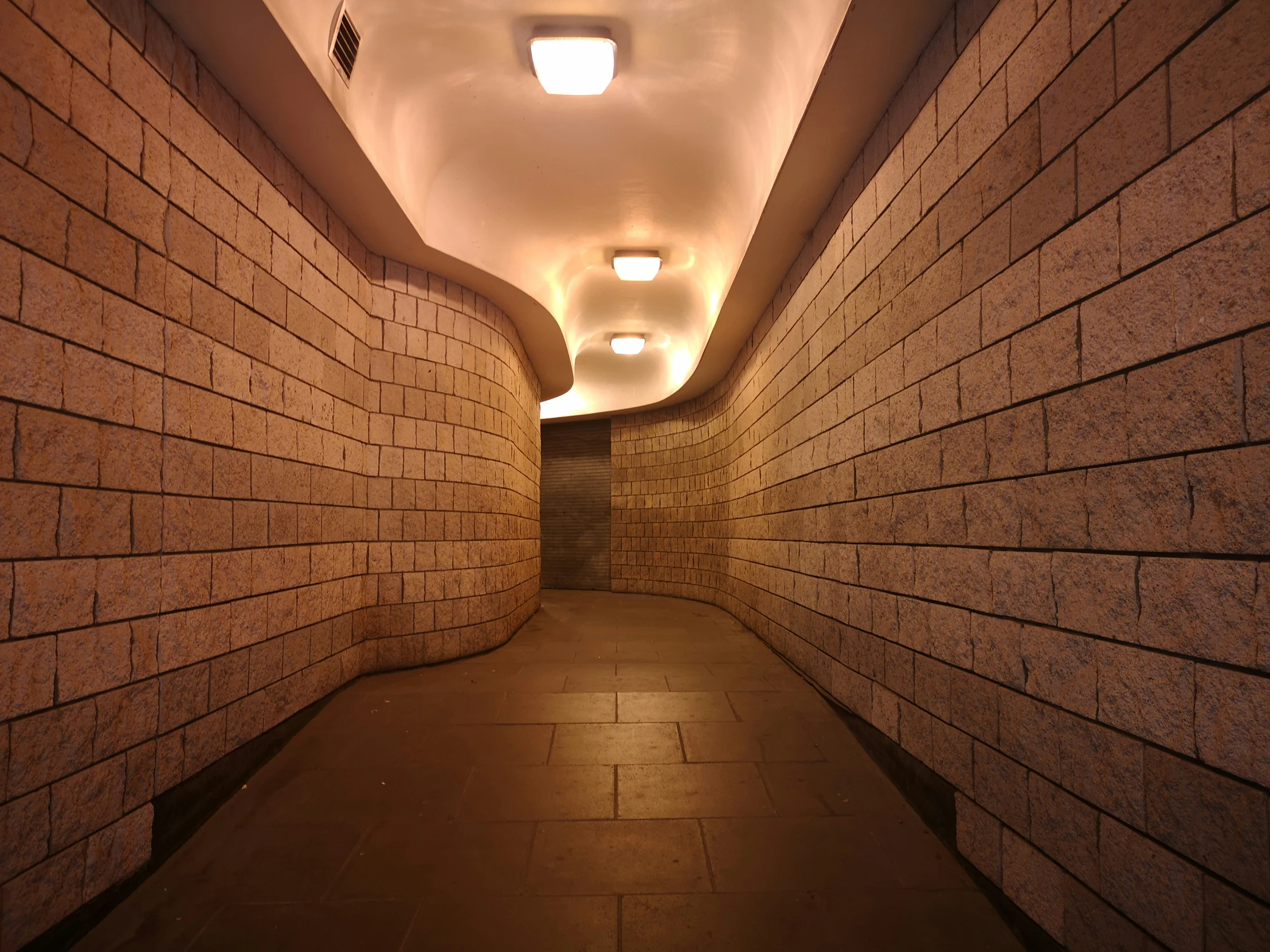 an image of an empty hallway at night